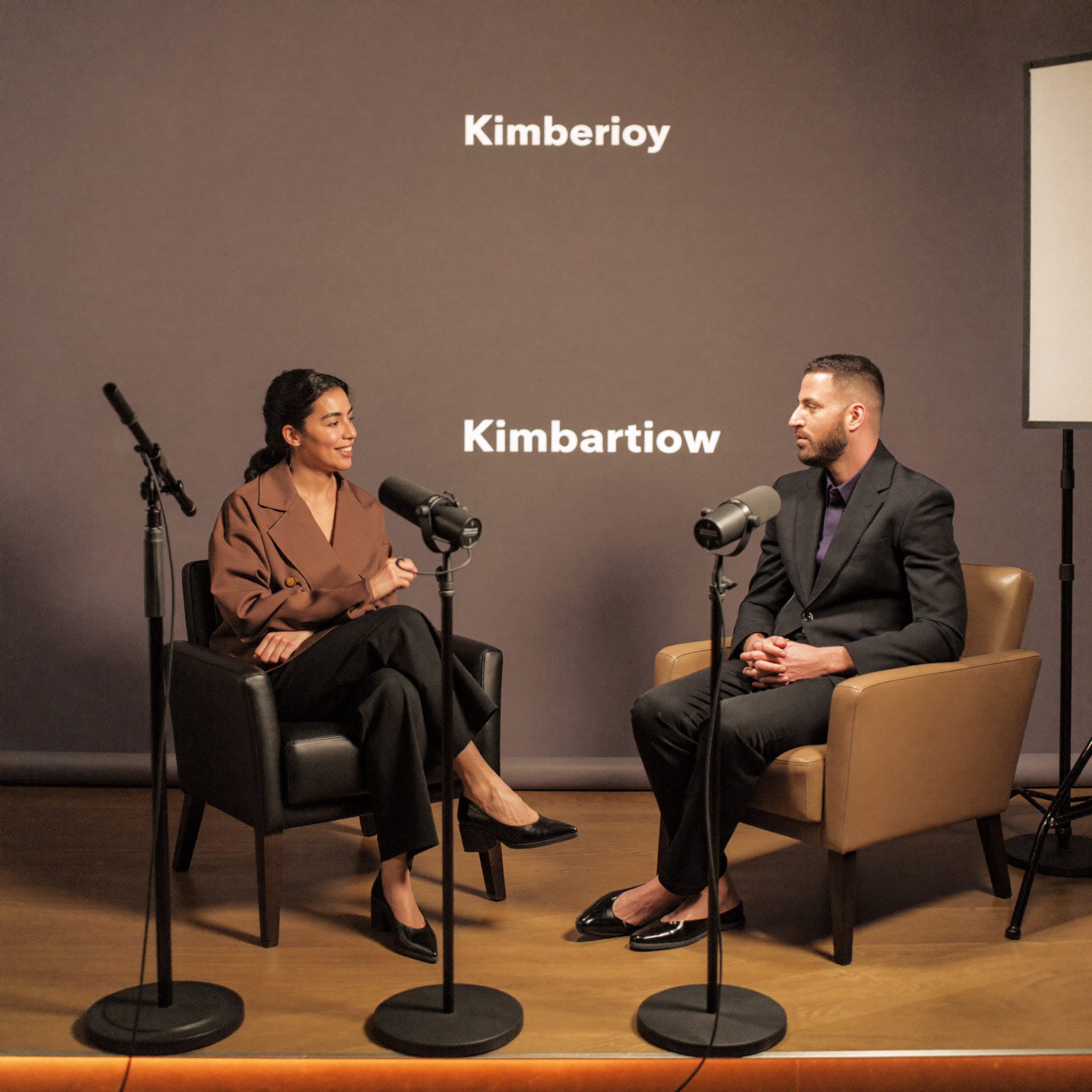 Broadcast interview setup with cameras and lighting at Halvorial studios
